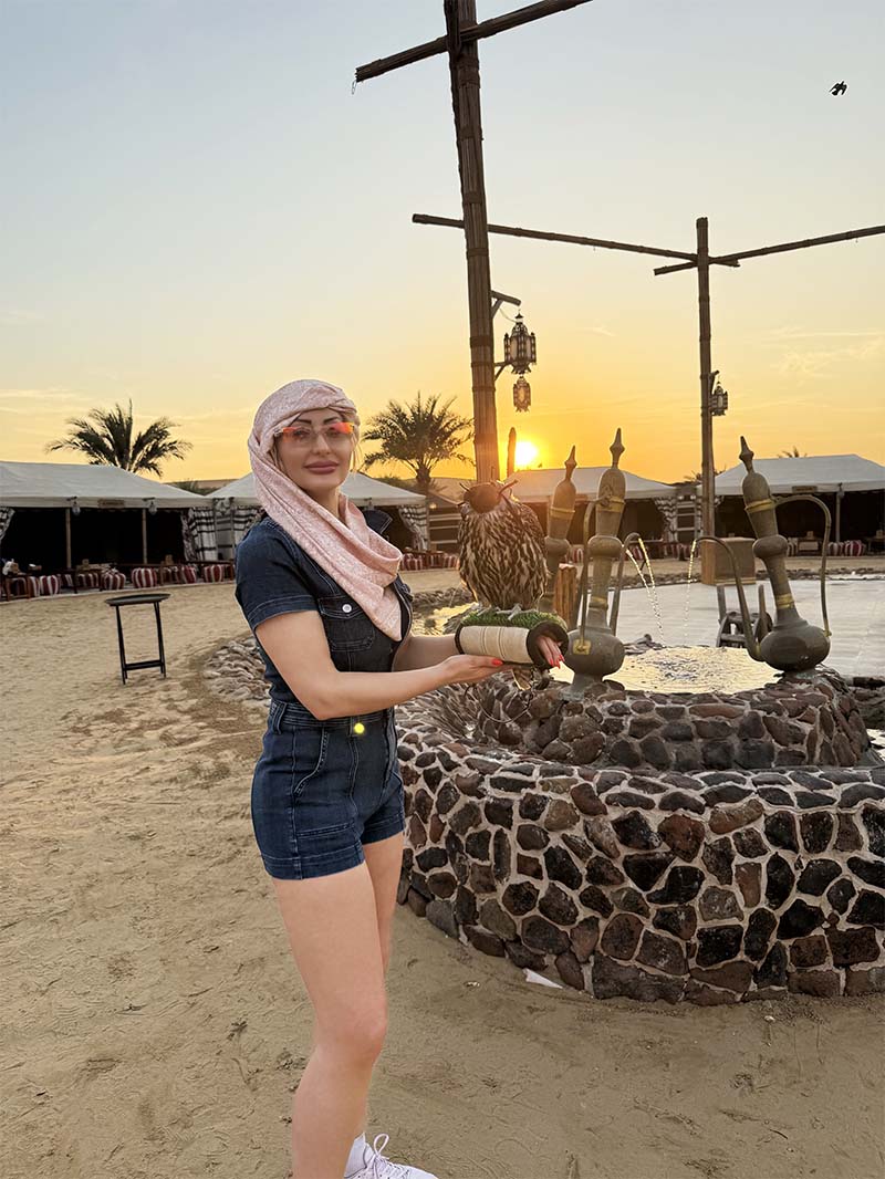 Me with a falcon on my arm.