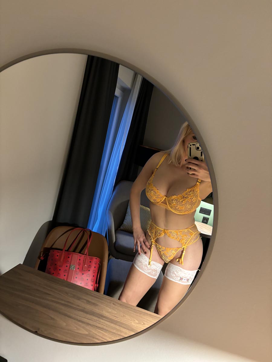 Lingerie selfie in the mirror.